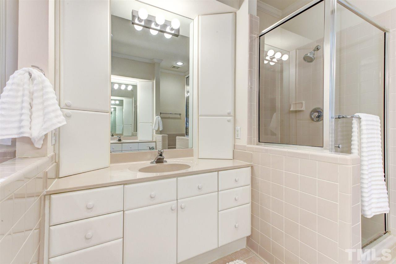 19 Covington Lane Durham, NC 27712 - Photo 17 of 30 a bathroom with a sink and a mirror