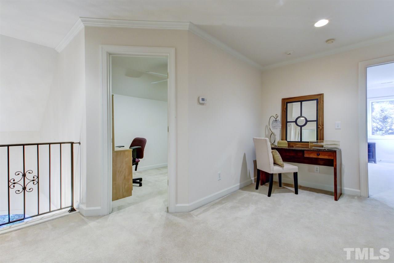 19 Covington Lane Durham, NC 27712 - Photo 18 of 30 a view of a workspace with furniture and a window
