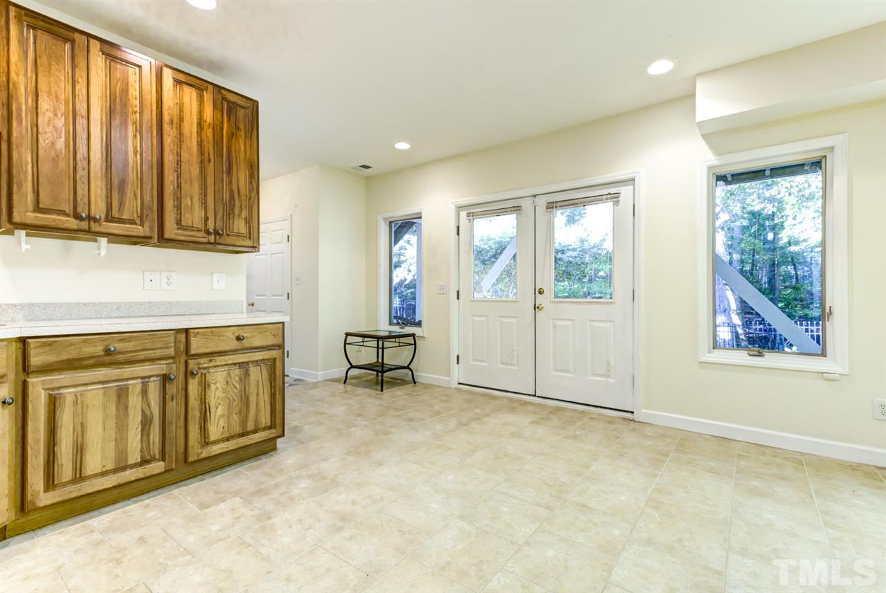 19 Covington Lane Durham, NC 27712 - Photo 24 of 30 a view of a kitchen with furniture and staircase