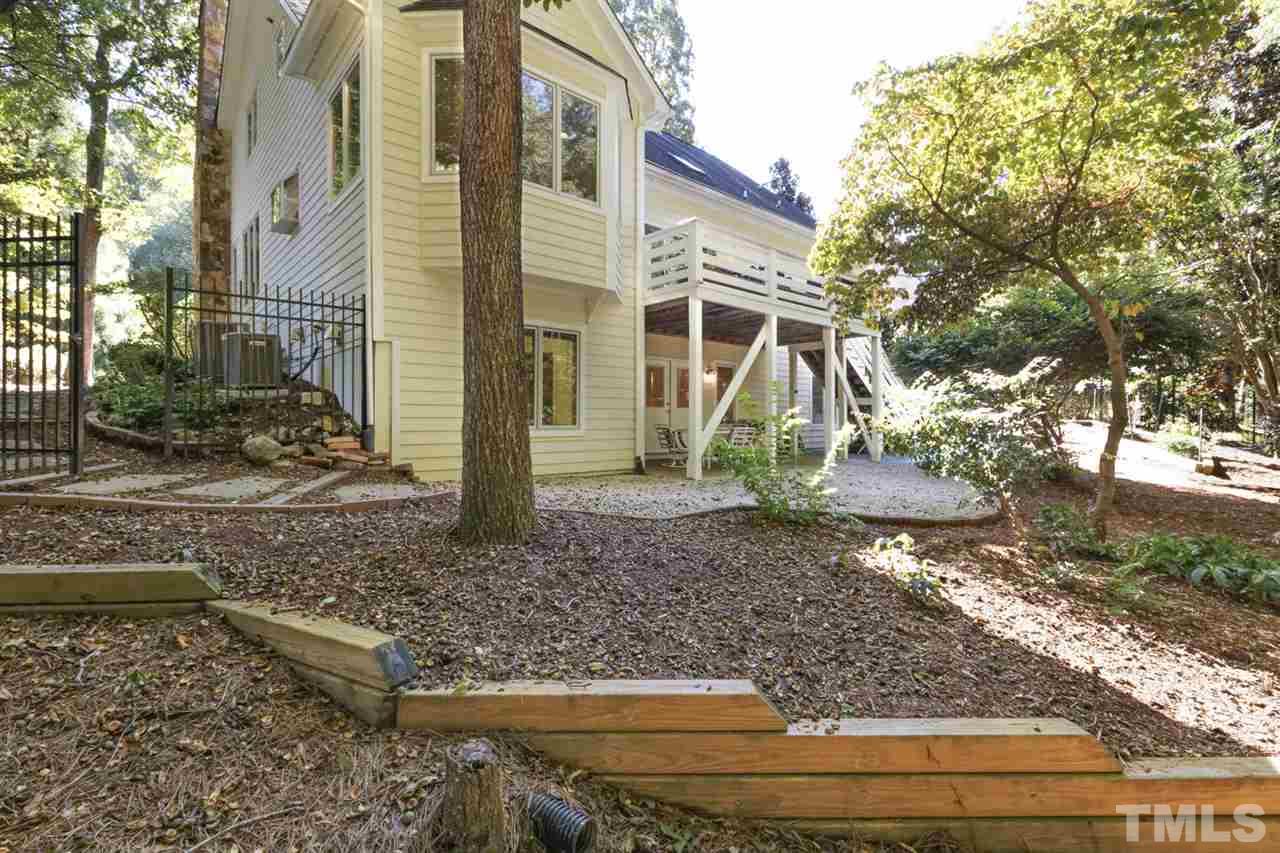 19 Covington Lane Durham, NC 27712 - Photo 29 of 30 a view of a house with a yard