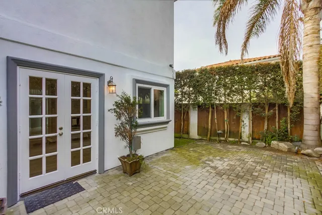 a view of house with backyard porch and garden