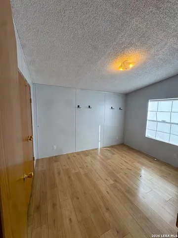 a view of a bathroom from a hallway