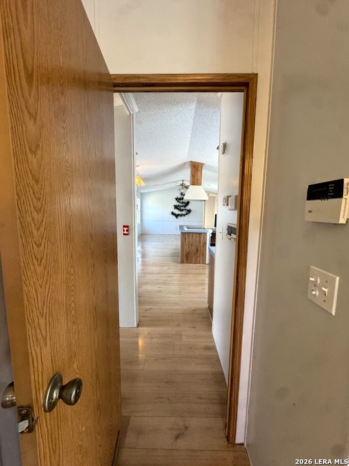 2057 Indian Hills Drive Spring Branch, TX 78070 - Photo 13 of 15 a view of a bathroom from a hallway