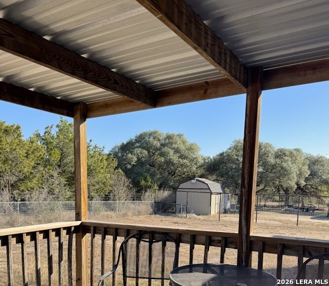 2057 Indian Hills Drive Spring Branch, TX 78070 - Photo 15 of 15 a view of a porch with furniture and backyard