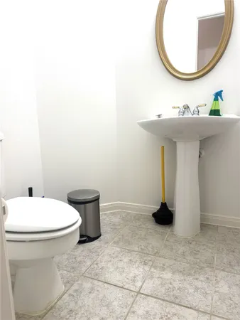 a bathroom with a sink and a toilet