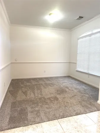 a view of a room with an empty space