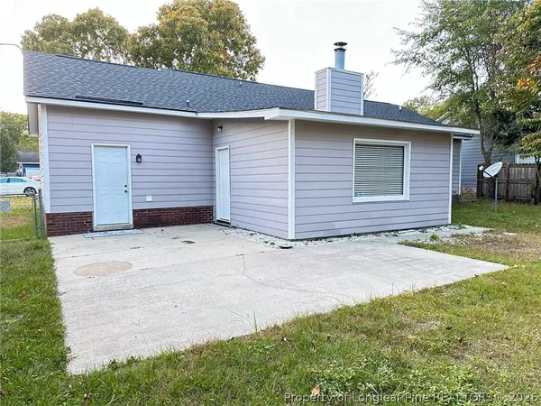 a view of backyard of house