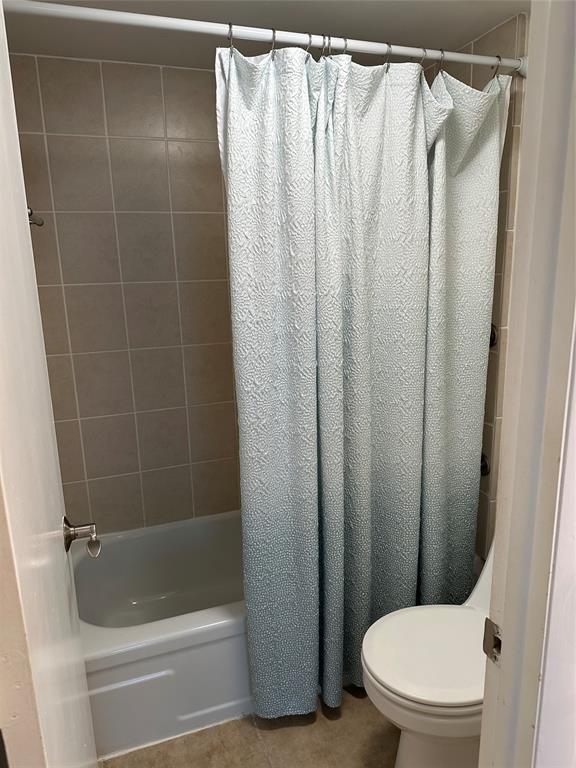 1900 South Ocean Boulevard, Unit 7J Lauderdale-by-the-Sea, FL 33062 - Photo 11 of 30 a bathroom with a shower and a toilet