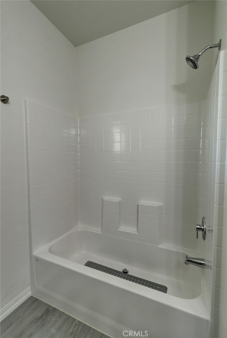 22221 Bloomfield Street, Unit 47 Cypress, CA 90630 - Photo 11 of 30 a bathroom with a bathtub