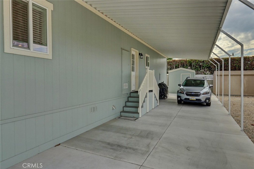 22221 Bloomfield Street, Unit 47 Cypress, CA 90630 - Photo 17 of 30 a view of a car garage both side of a road