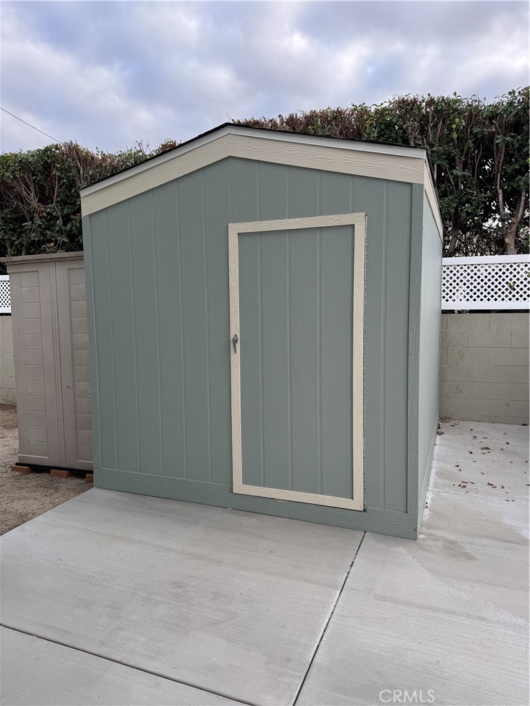 22221 Bloomfield Street, Unit 47 Cypress, CA 90630 - Photo 18 of 30 a view of a house with a yard