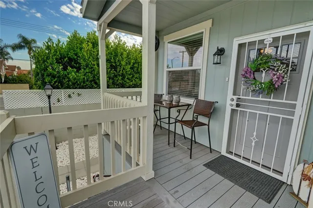 a view of balcony with furniture