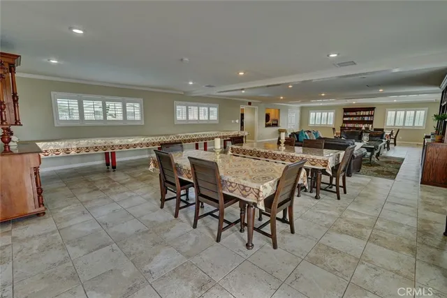 a view of a house with backyard and porch