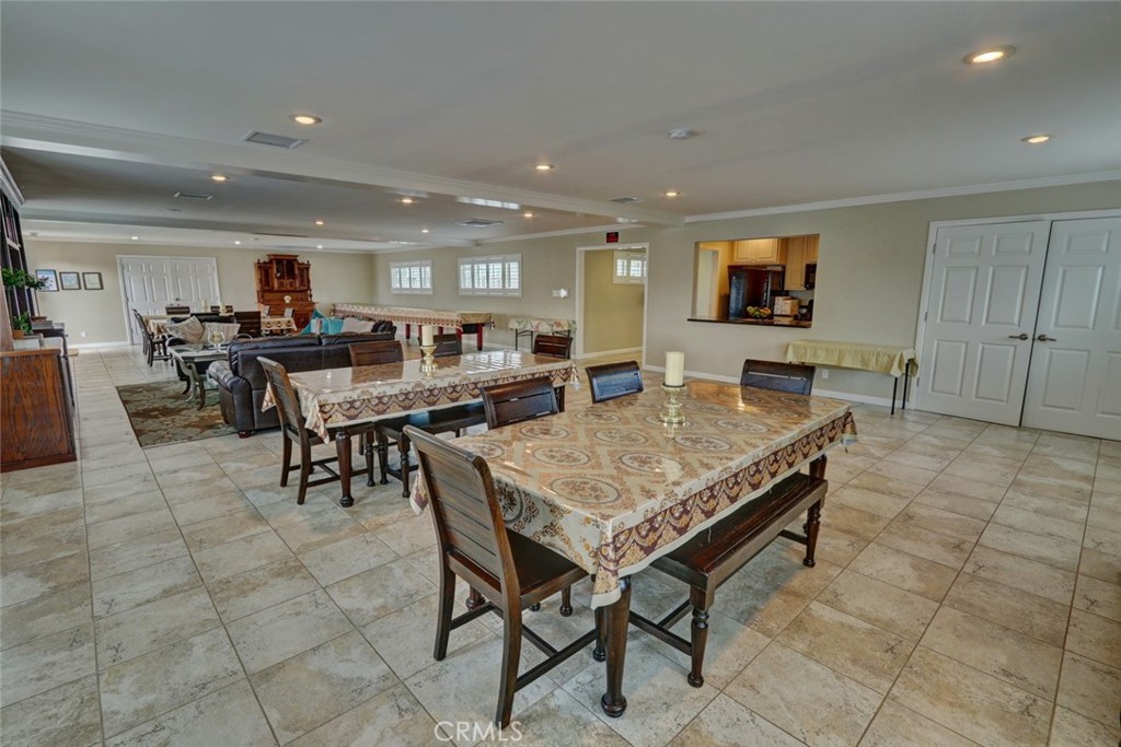 22221 Bloomfield Street, Unit 47 Cypress, CA 90630 - Photo 26 of 30 a view of a dining room with furniture