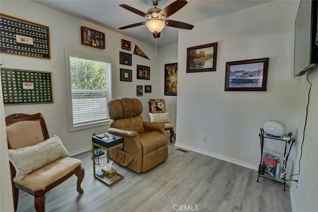 a view of a dining room with furniture and window