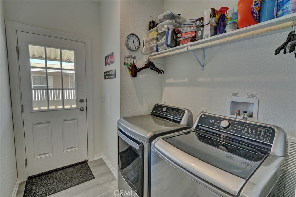 22221 Bloomfield Street, Unit 47 Cypress, CA 90630 - Photo 9 of 30 a utility room with dryer and washer