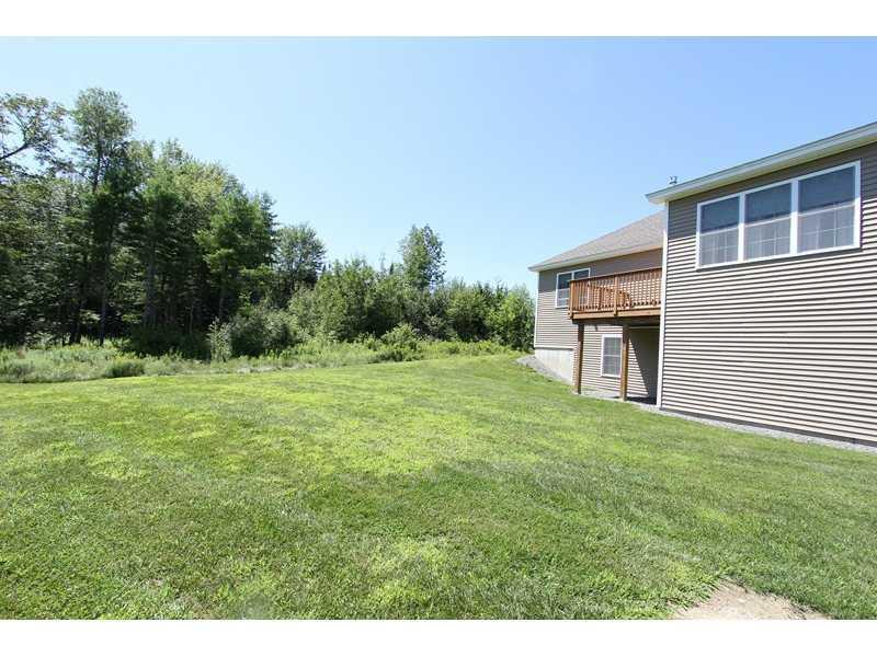 49 Highland Ridge Drive, Unit 49 Hampden, ME 04444 - Photo 32 of 34 Exterior Back.