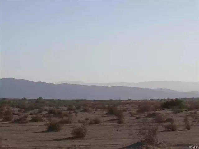 a view of mountain and sunset