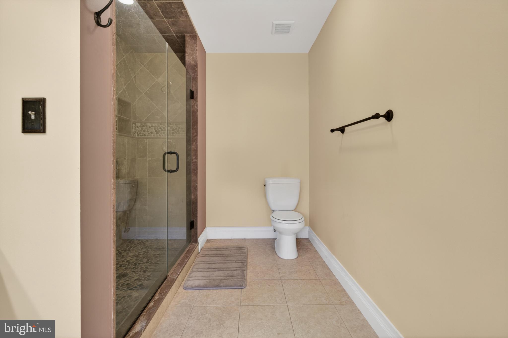 117 State Avenue Lindenwold, NJ 08021 - Photo 43 of 58 a bathroom with a toilet and a shower