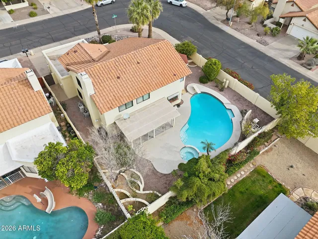 an aerial view of residential building with an ocean view