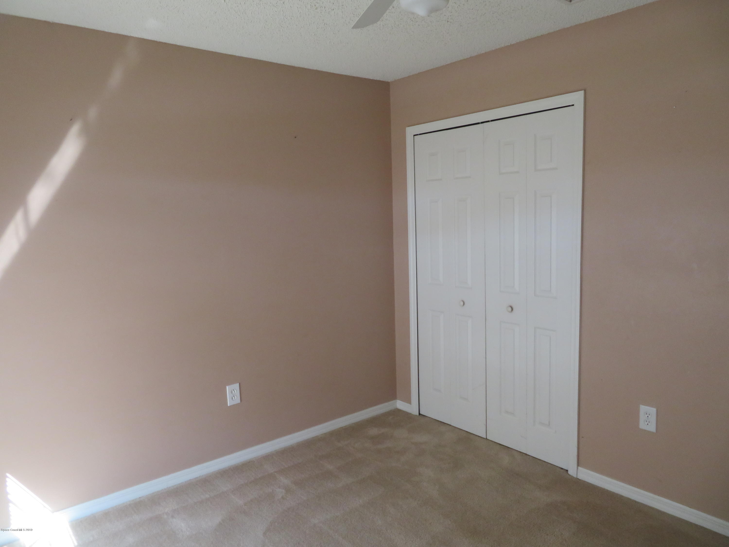 801 Clifton Road Southeast Palm Bay, FL 32909 - Photo 17 of 25 a view of an empty room