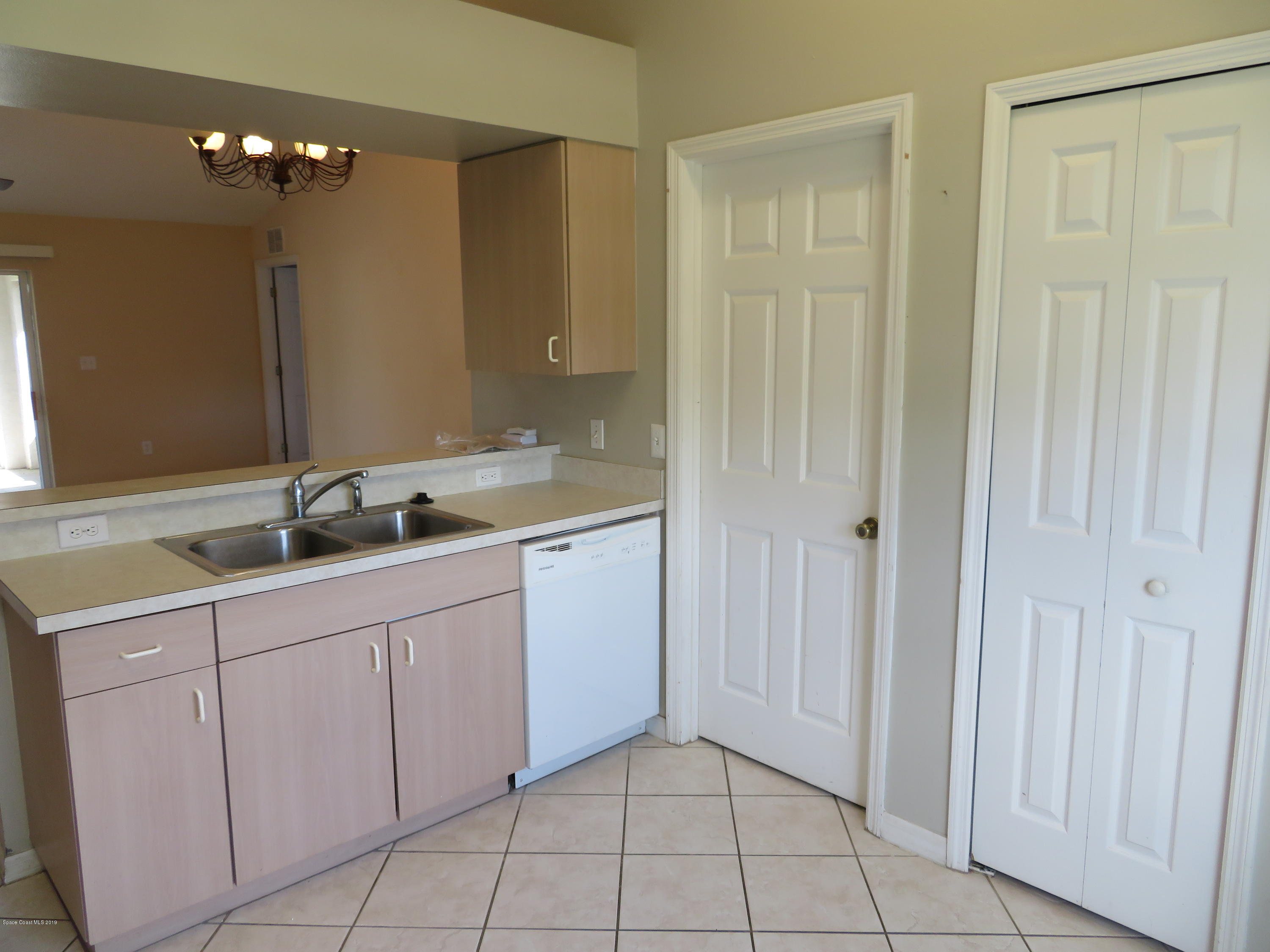 801 Clifton Road Southeast Palm Bay, FL 32909 - Photo 9 of 25 a bathroom with a sink and a mirror
