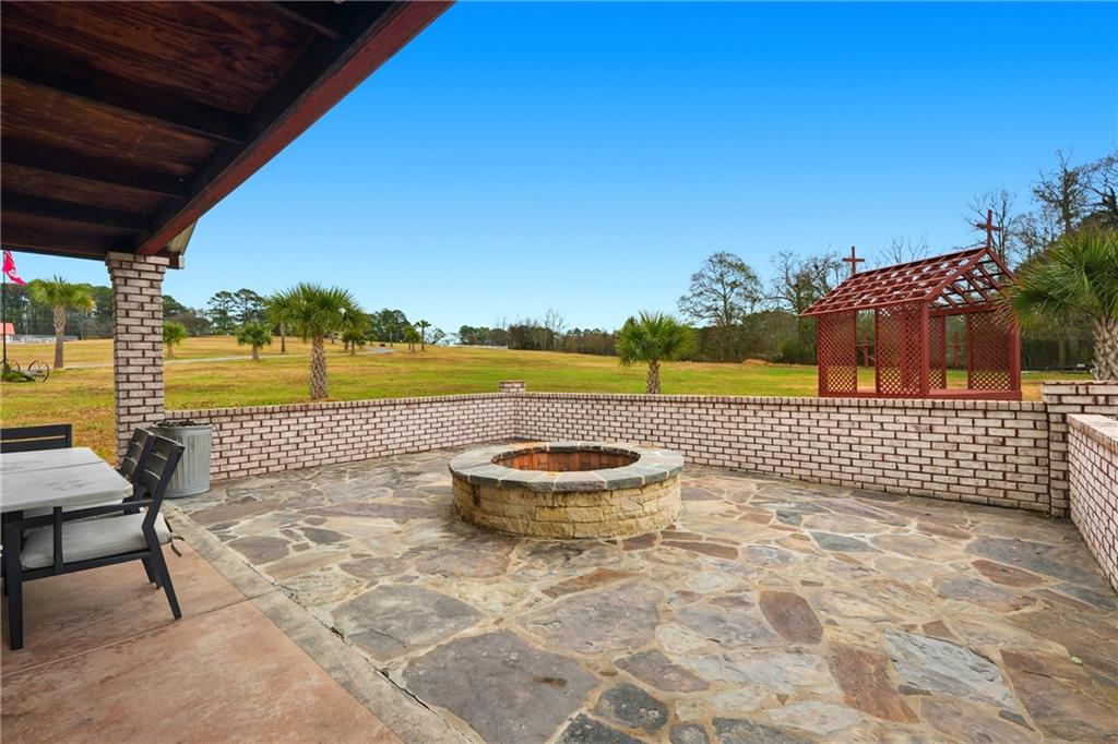 1188 Carl-Bethlehem Road Winder, GA 30680 - Photo 14 of 31 a view of swimming pool with outdoor seating and plants