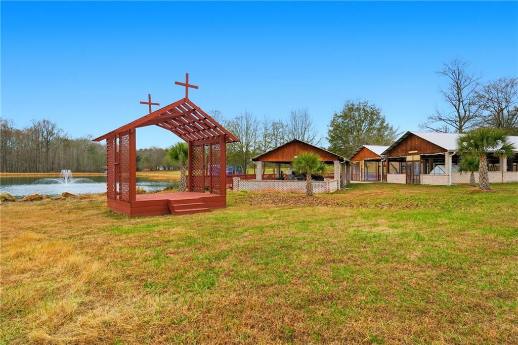 1188 Carl-Bethlehem Road Winder, GA 30680 - Photo 16 of 31 a view of a house with swimming pool