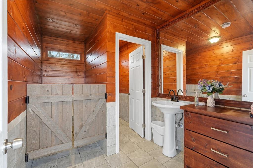 1188 Carl-Bethlehem Road Winder, GA 30680 - Photo 21 of 31 a view of a patio with a wooden fence