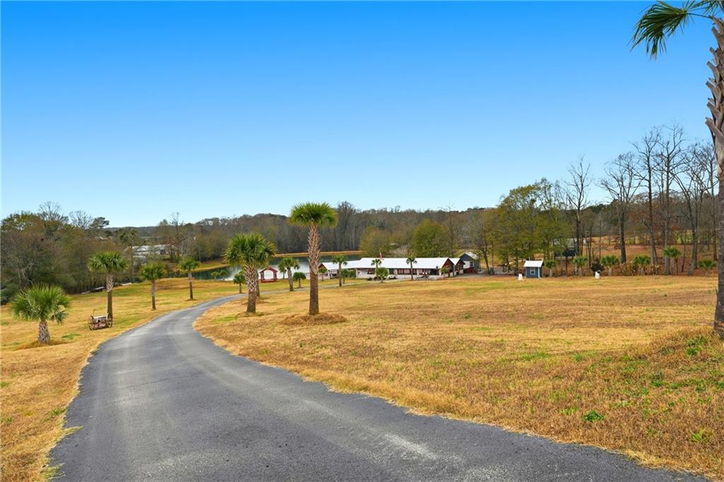 1188 Carl-Bethlehem Road Winder, GA 30680 - Photo 5 of 31 a view of a lake with a mountain