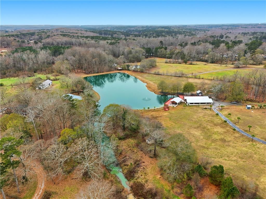 1188 Carl-Bethlehem Road Winder, GA 30680 - Photo 8 of 31 a view of a lake with a mountain in the back