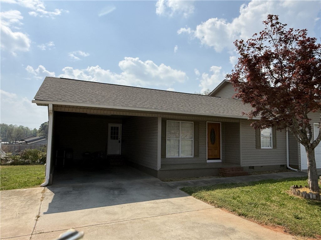 311 Dixie Drive Seneca, SC 29672 - Photo 1 of 8 This charming home offers a convenient carport and inviting front facade, perfect for daily living.