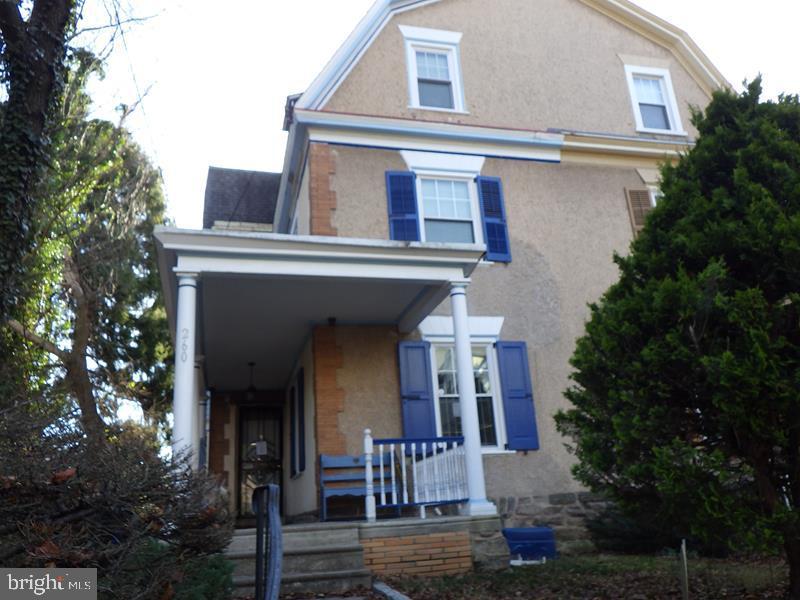 260 Harvey Street Philadelphia, PA 19144 - Photo 1 of 25 front view of a house with a small yard