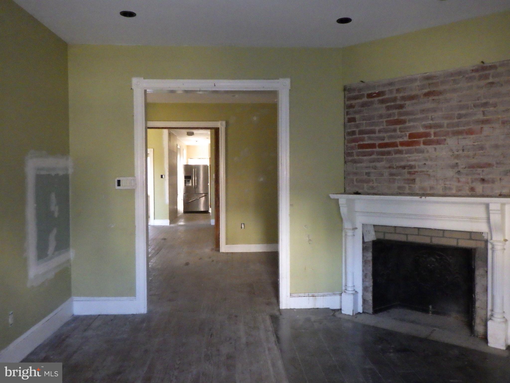 260 Harvey Street Philadelphia, PA 19144 - Photo 7 of 25 a view of a livingroom with a fireplace