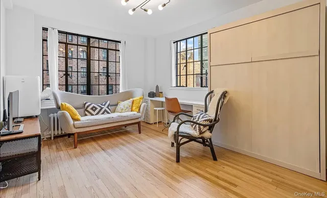 a kitchen with a refrigerator and a stove