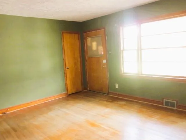 an empty room with a window