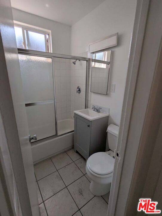 9815 Imperial Highway, Unit 40 Downey, CA 90242 - Photo 10 of 20 a white toilet sitting next to a bathroom sink