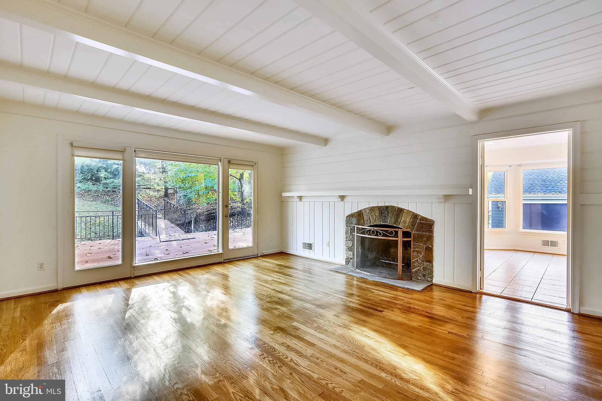 9320 Winterset Drive Potomac, MD 20854 - Photo 25 of 70 Sunny family room exits to ground-level deck