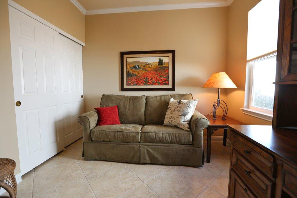 109 Ranier Lane Georgetown, TX 78633 - Photo 15 of 18 A well-lit, compact room with sleek tile flooring.