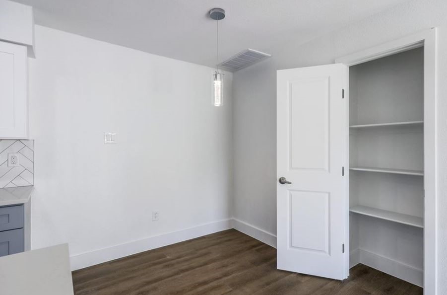 114 East 31st Street, Unit 314 Austin, TX 78705 - Photo 11 of 20 a view of an empty room with wooden floor