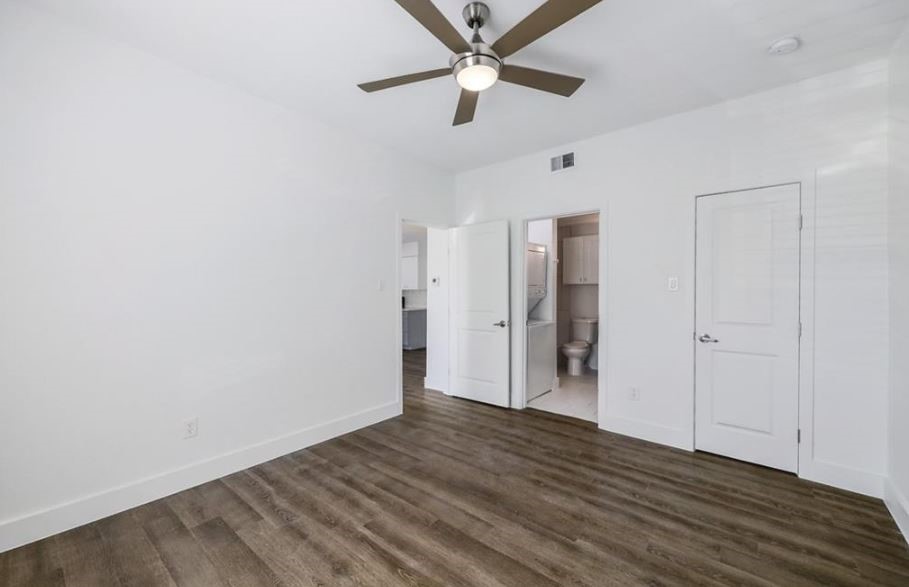 114 East 31st Street, Unit 314 Austin, TX 78705 - Photo 14 of 20 a view of empty room with wooden floor