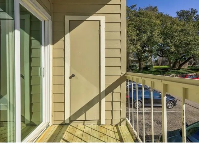 a building with trees in front of it