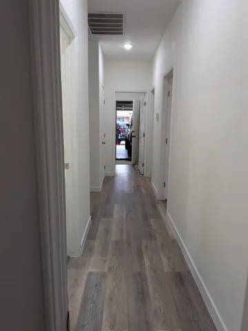 a view of a room that has a window