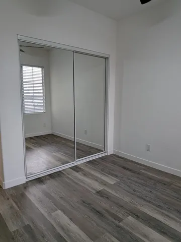 a view of a yard with a car park