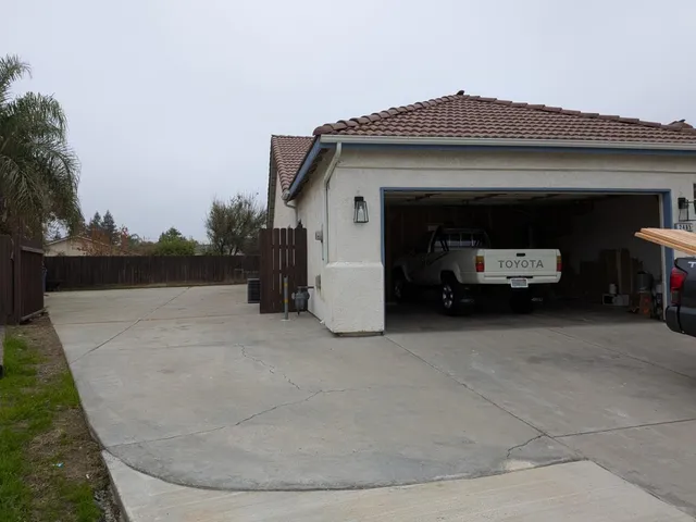 a view of a car garage of a house