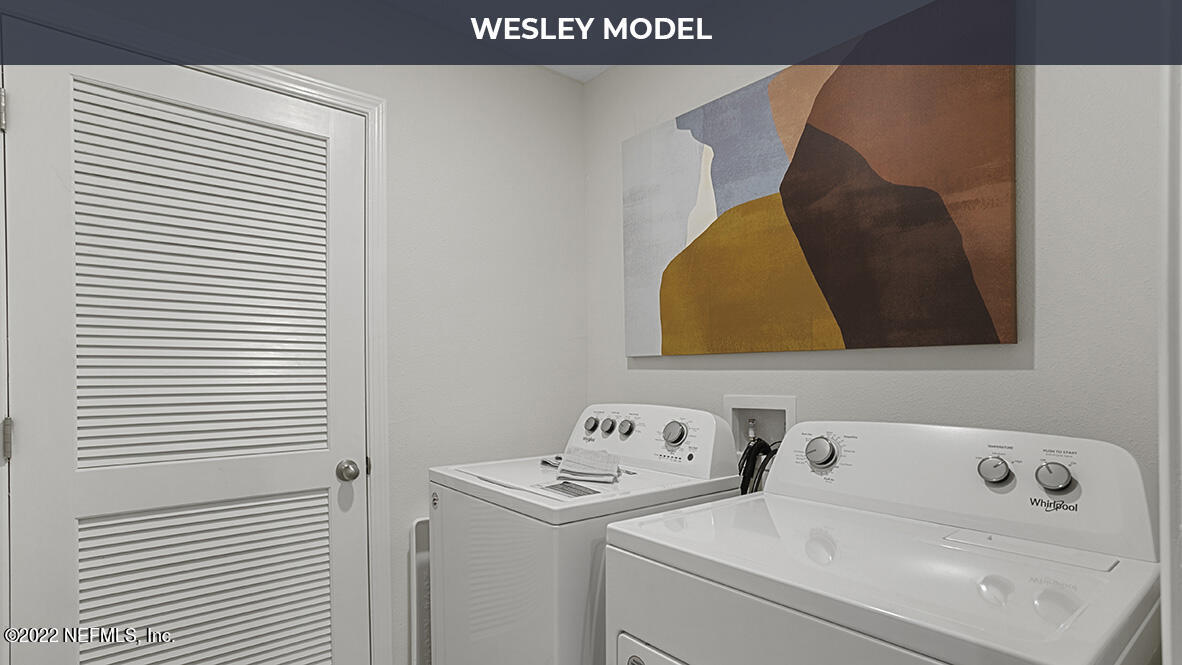 57 Java Lane St. Augustine, FL 32092 - Photo 14 of 37 a utility room with dryer and washer