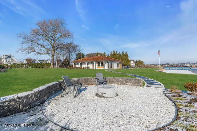 a view of a terrace with a yard