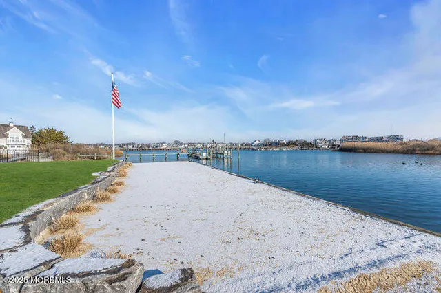 a view of a lake with a beach