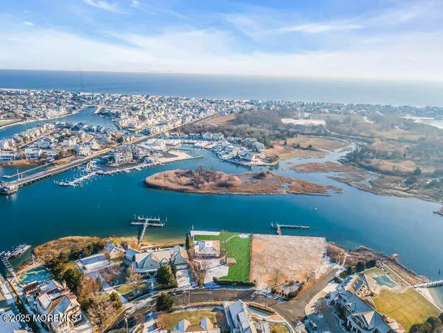 an aerial view of a houses with a outdoor space