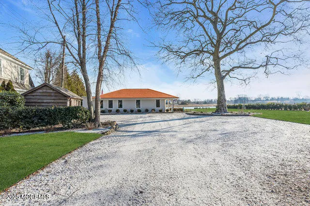 a house view with a garden space